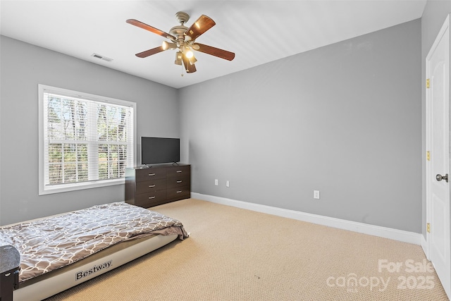 1386 21st Ave NE, Hickory, NC 28601 - bedroom featuring light carpet, baseboards, and ceiling fan