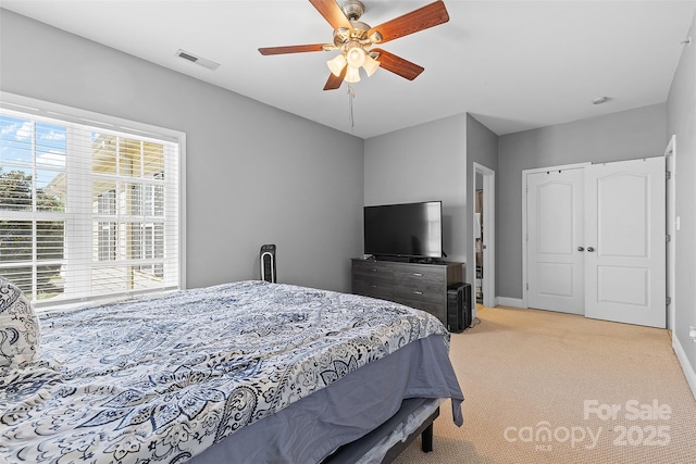 1386 21st Ave NE, Hickory, NC 28601 - bedroom featuring light carpet, multiple windows, and baseboards