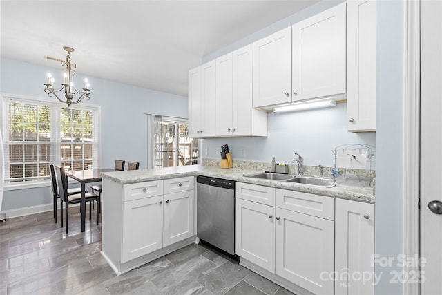 1386 21st Ave NE, Hickory, NC 28601 - kitchen featuring dishwasher, a sink, a peninsula, a chandelier, and white cabinets