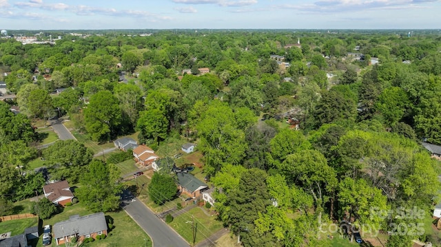 1801 Weststone Dr, Charlotte, NC 28208 - birds eye view of property with a wooded view