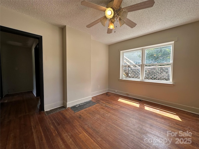 31 Hildebrand St Unit 1 & 154, Asheville, NC 28801 - unfurnished room featuring a textured ceiling, baseboards, visible vents, ceiling fan, and hardwood / wood-style floors