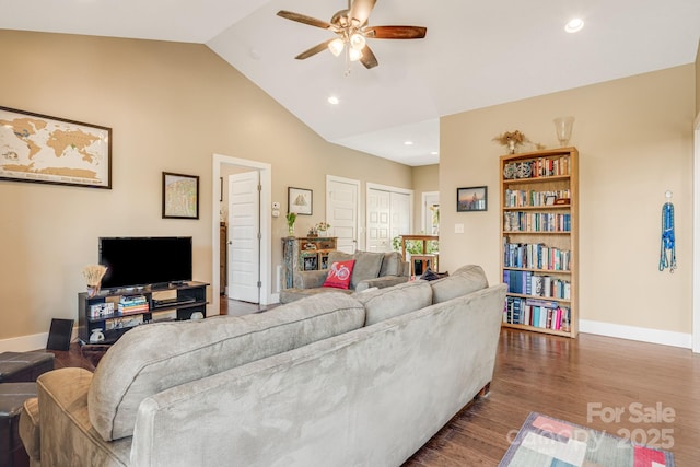 living room featuring baseboards, recessed lighting, a ceiling fan, lofted ceiling, and dark wood-style floors