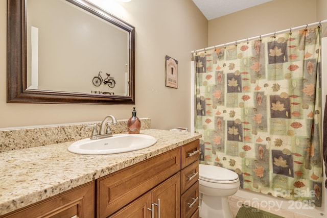 bathroom featuring a shower with curtain, toilet, tile patterned flooring, and vanity