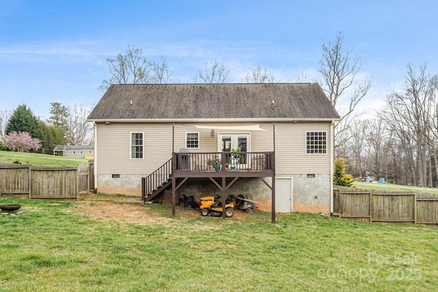 back of house featuring a fenced backyard, a yard, stairway, and a deck