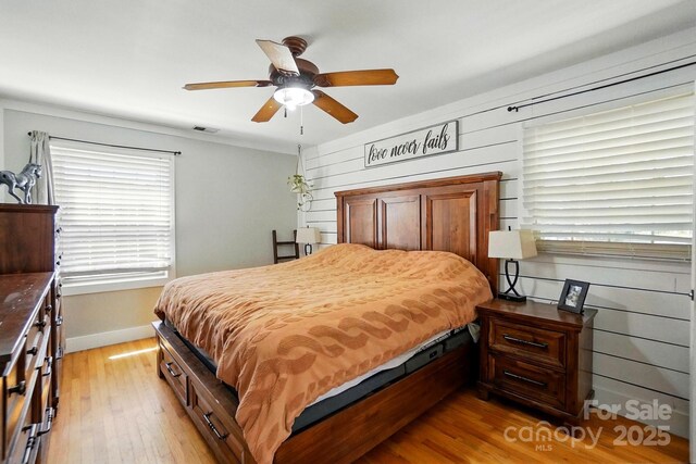 110 Tanglewood Dr, Kannapolis, NC 28081 - bedroom featuring visible vents, light wood-style flooring, ceiling fan, and baseboards