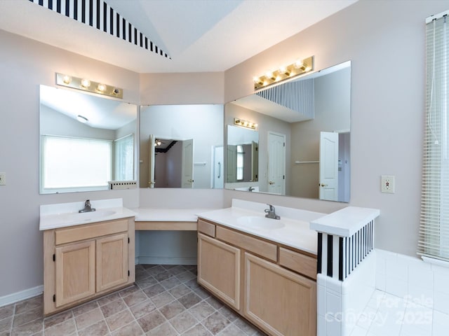 full bathroom with vanity and lofted ceiling