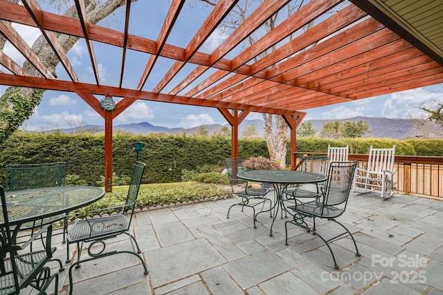 142 Country Club Dr, Waynesville, NC 28786 - view of patio / terrace featuring a pergola, outdoor dining space, and a mountain view