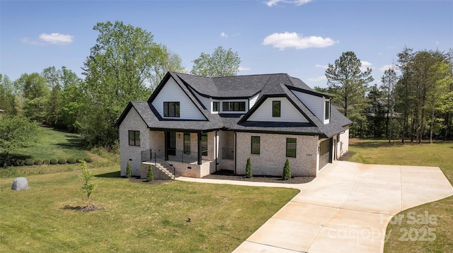 modern inspired farmhouse with brick siding, a shingled roof, driveway, and a front lawn