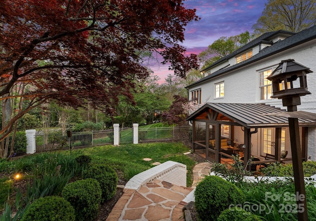 200 Highland Forest Dr, Charlotte, NC 28270 - yard at dusk featuring a sunroom