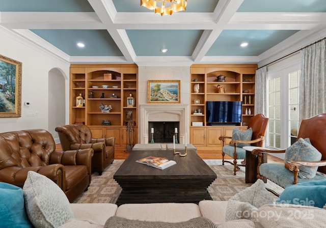 200 Highland Forest Dr, Charlotte, NC 28270 - living area with coffered ceiling, ornamental molding, arched walkways, beamed ceiling, and a fireplace with raised hearth