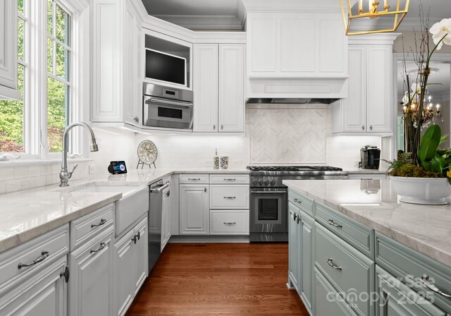 200 Highland Forest Dr, Charlotte, NC 28270 - kitchen featuring appliances with stainless steel finishes, white cabinets, a sink, and tasteful backsplash