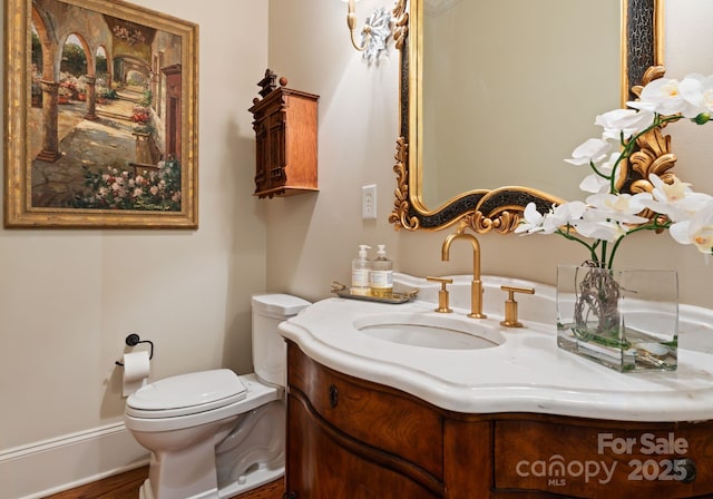 200 Highland Forest Dr, Charlotte, NC 28270 - bathroom with vanity, toilet, and wood finished floors