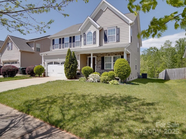 848 Wingthorn Rose Dr, Gastonia, NC 28056 - traditional-style house with fence, central AC, concrete driveway, a garage, and a front lawn