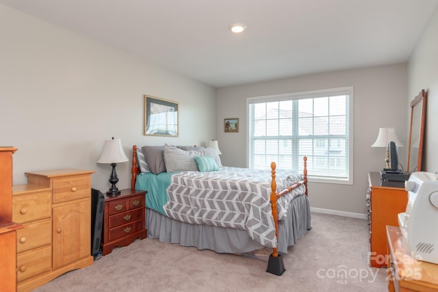 2097 Saddlebred Dr, Iron Station, NC 28080 - bedroom with light colored carpet and baseboards