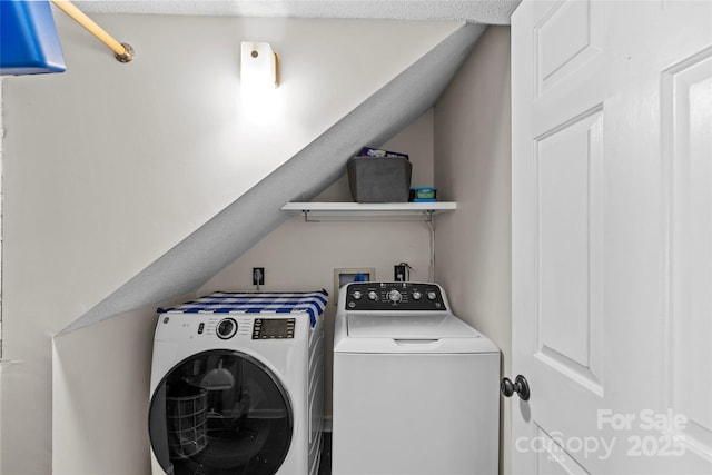 laundry area featuring washer and clothes dryer