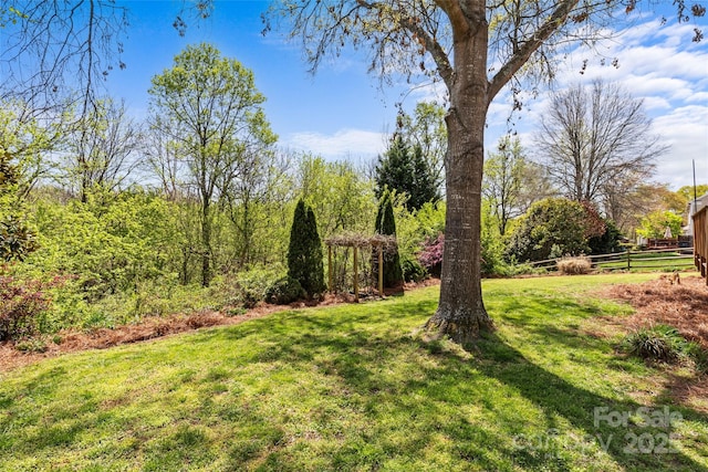 view of yard with fence