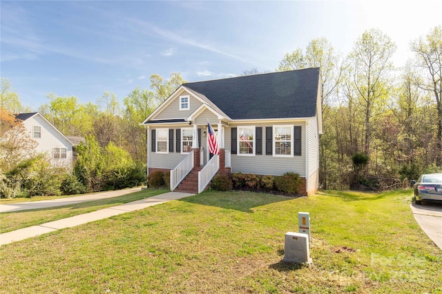 view of front of home featuring a front lawn