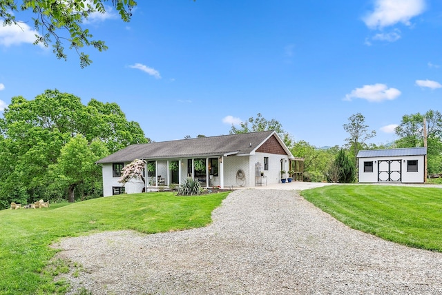 9 Mikayla Ln, Candler, NC 28715 - ranch-style house featuring gravel driveway and a front yard