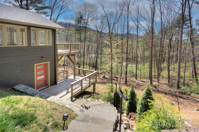 80 Vance Gap Rd, Asheville, NC 28805 - view of side of property with a forest view, a shingled roof, and a deck