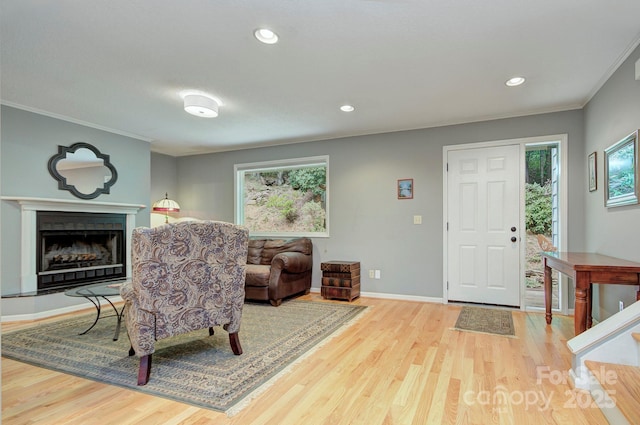80 Vance Gap Rd, Asheville, NC 28805 - living room with recessed lighting, ornamental molding, baseboards, a fireplace, and wood finished floors