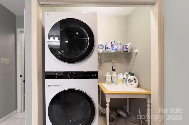80 Vance Gap Rd, Asheville, NC 28805 - laundry room featuring tile patterned flooring and stacked washer / drying machine