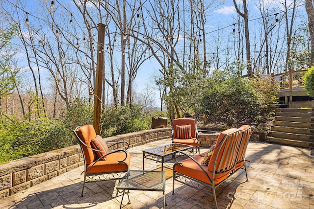650 Faircrest Ln, Penrose, NC 28766 - view of patio with stairway and an outdoor living space with a fire pit