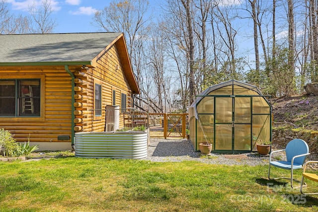 650 Faircrest Ln, Penrose, NC 28766 - view of grassy yard with an exterior structure and an outbuilding