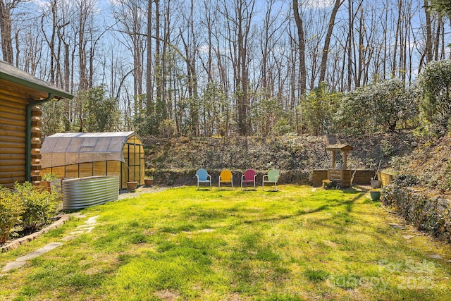 650 Faircrest Ln, Penrose, NC 28766 - view of green lawn featuring a greenhouse, central AC unit, and an outdoor structure