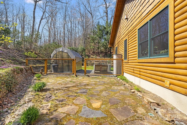 650 Faircrest Ln, Penrose, NC 28766 - view of patio / terrace featuring central AC unit and an outbuilding