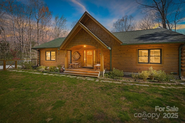 650 Faircrest Ln, Penrose, NC 28766 - log cabin with a porch, roof with shingles, and log siding