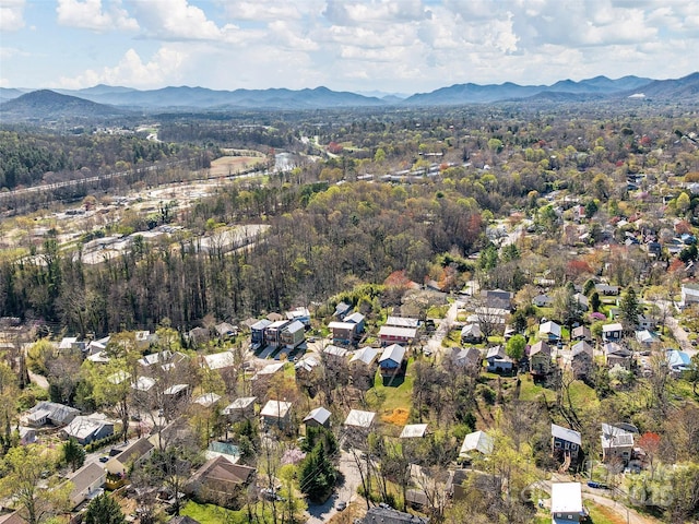 aerial view with a residential view, a forest view, and a mountain view