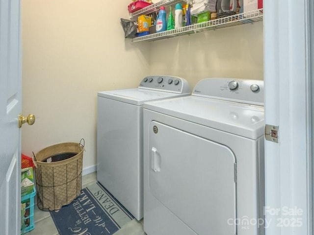 56 Lake Mist Ct Unit 30 & 30A, Nebo, NC 28761 - washroom with independent washer and dryer, light tile patterned floors, and laundry area