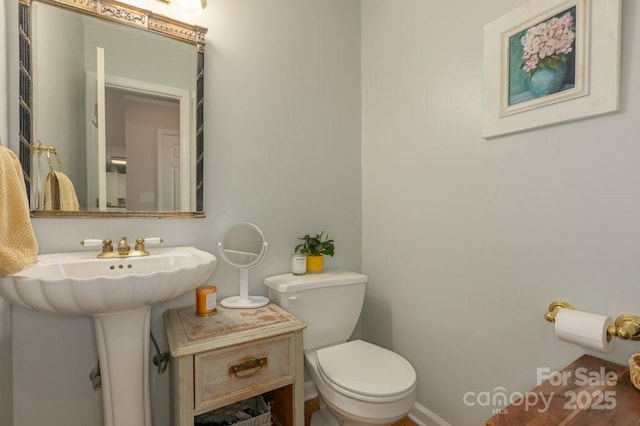 56 Lake Mist Ct Unit 30 & 30A, Nebo, NC 28761 - half bathroom featuring baseboards, a sink, and toilet