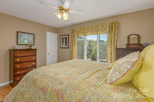 56 Lake Mist Ct Unit 30 & 30A, Nebo, NC 28761 - bedroom with ceiling fan, baseboards, and wood finished floors