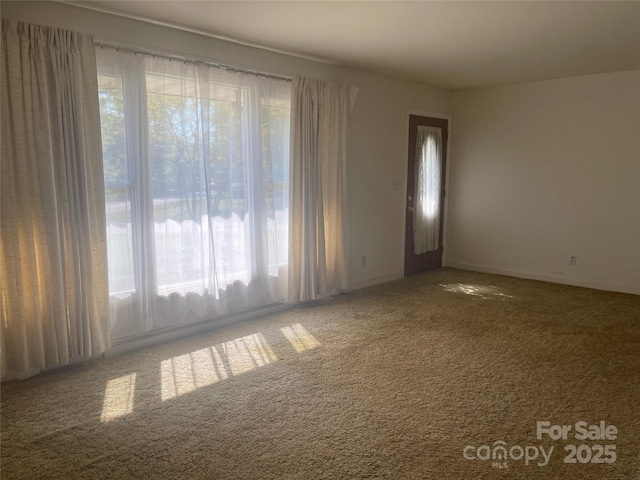 view of carpeted spare room