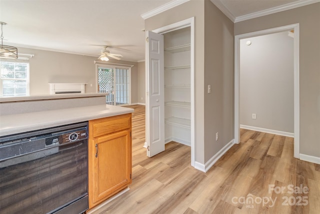 kitchen featuring ceiling fan, dishwasher, light countertops, light wood-style floors, and ornamental molding