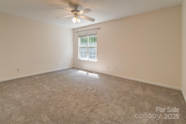 9 Willoughby Run Dr, Asheville, NC 28803 - carpeted empty room with a ceiling fan and baseboards