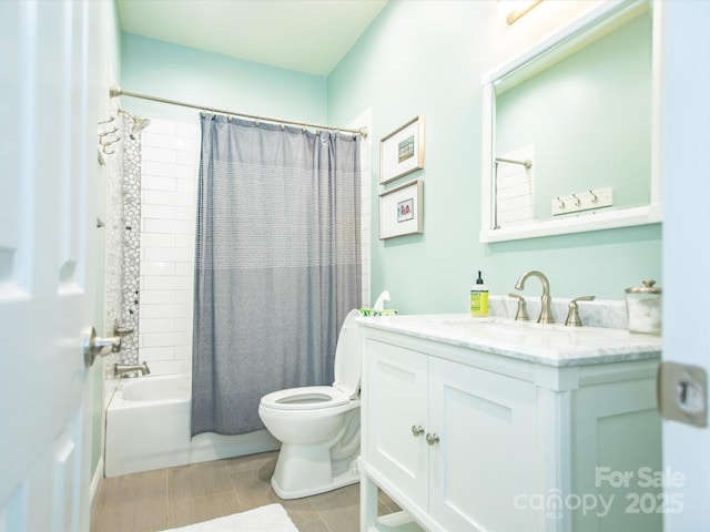 bathroom with toilet, shower / bathtub combination with curtain, and vanity
