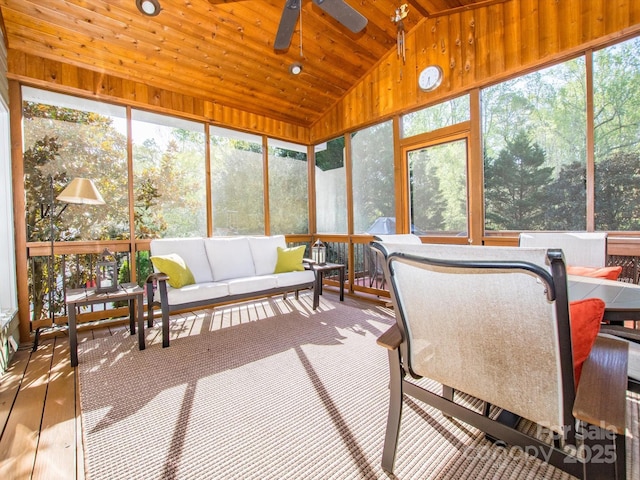 sunroom featuring outdoor lounge area and ceiling fan