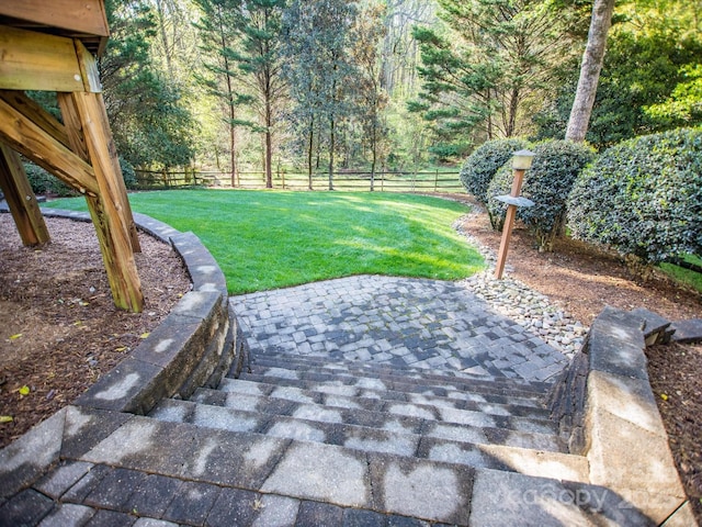 view of yard with a patio area and fence