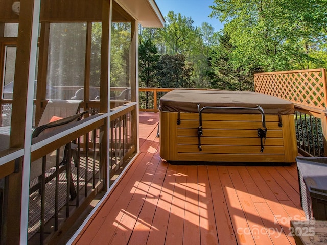 deck with a hot tub