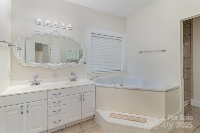 7900 Gilead Rd, Huntersville, NC 28078 - full bathroom featuring tile patterned floors, a garden tub, and double vanity