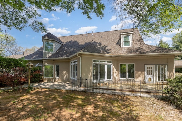 7900 Gilead Rd, Huntersville, NC 28078 - rear view of house with a patio area, a shingled roof, french doors, and stucco siding