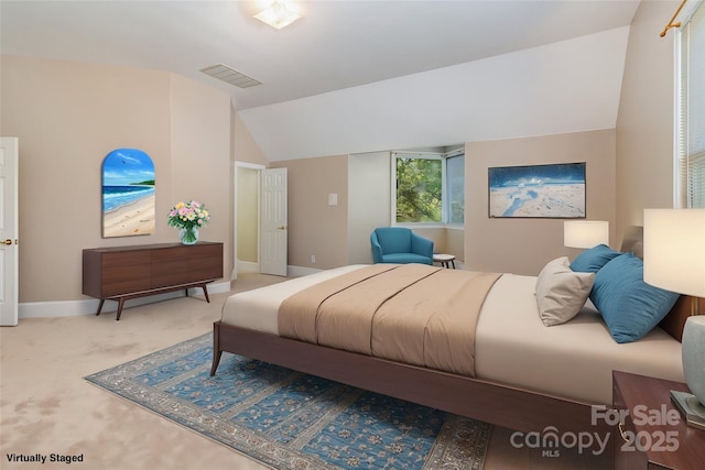 7900 Gilead Rd, Huntersville, NC 28078 - carpeted bedroom with lofted ceiling and baseboards