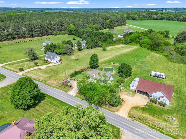bird's eye view with a forest view