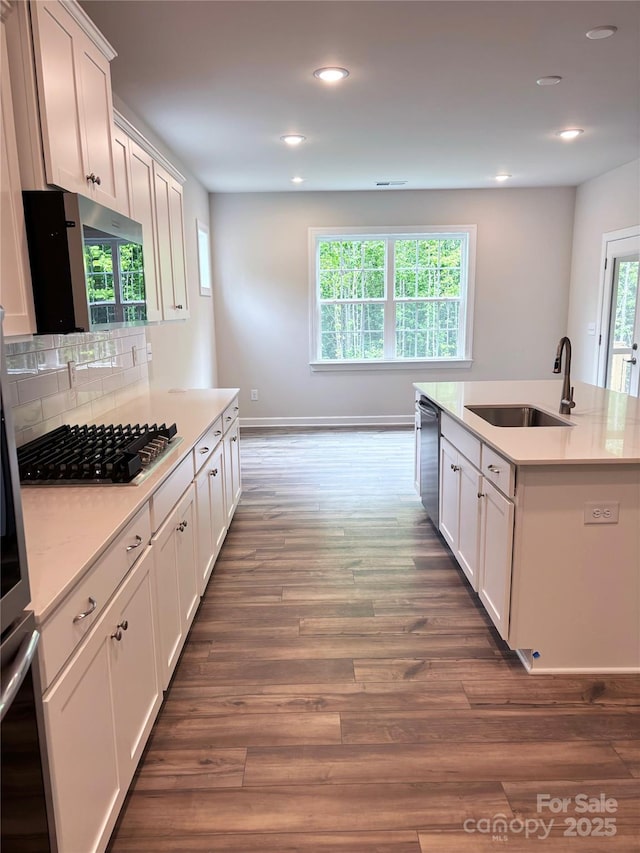 7001 New Town Rd, Waxhaw, NC 28173 - kitchen featuring a sink, dishwasher, light countertops, healthy amount of natural light, and recessed lighting