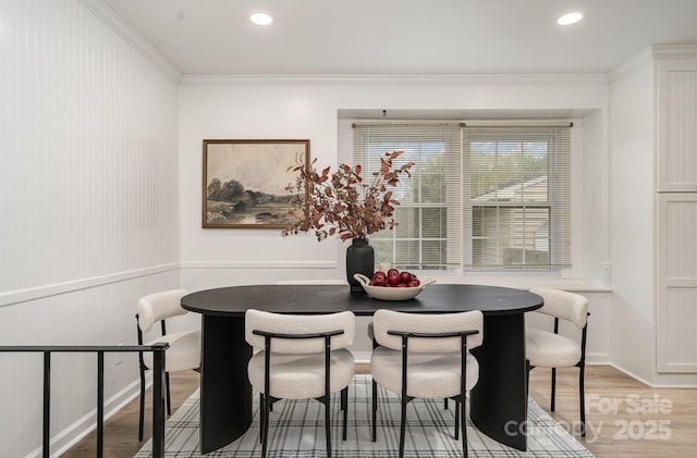 5329 Glenbrier Dr, Charlotte, NC 28212 - dining area featuring light wood-style flooring, crown molding, recessed lighting, wainscoting, and breakfast area
