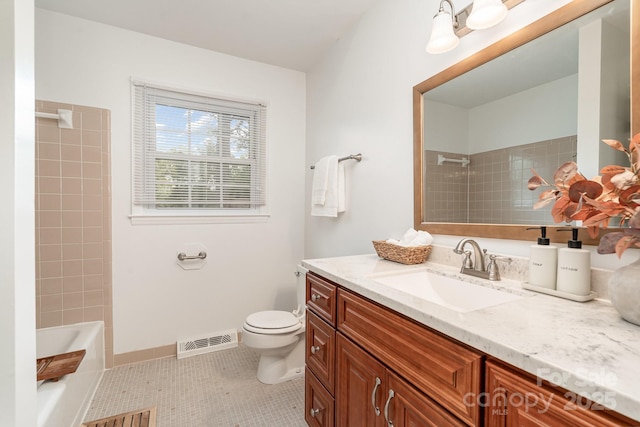 5329 Glenbrier Dr, Charlotte, NC 28212 - full bathroom featuring vanity, toilet, tile patterned flooring, and washtub / shower combination