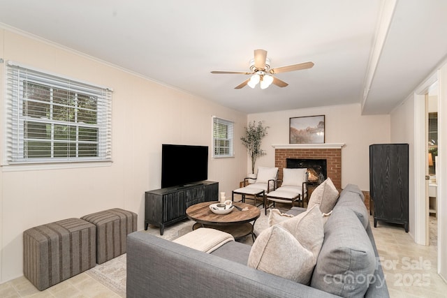 5329 Glenbrier Dr, Charlotte, NC 28212 - living room with ceiling fan, a fireplace, and ornamental molding