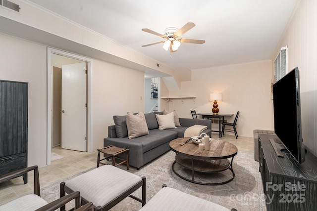 5329 Glenbrier Dr, Charlotte, NC 28212 - living room with ceiling fan, stairway, and ornamental molding